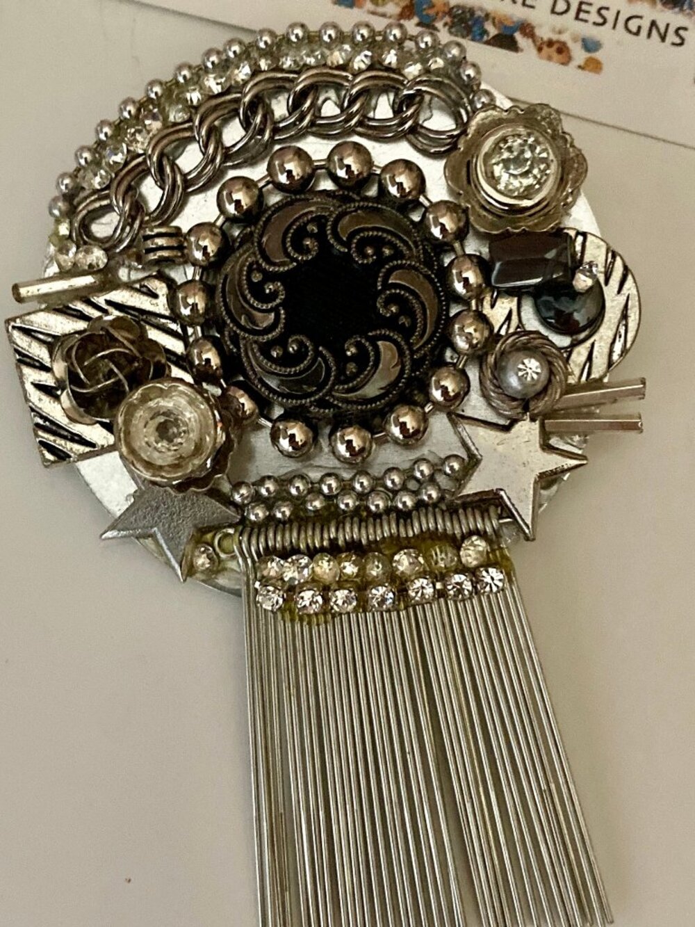 ONE OF A KIND BROOCH MADE FROM ASSORTED SILVER FINDINGS-LOCALY MADE IN USA